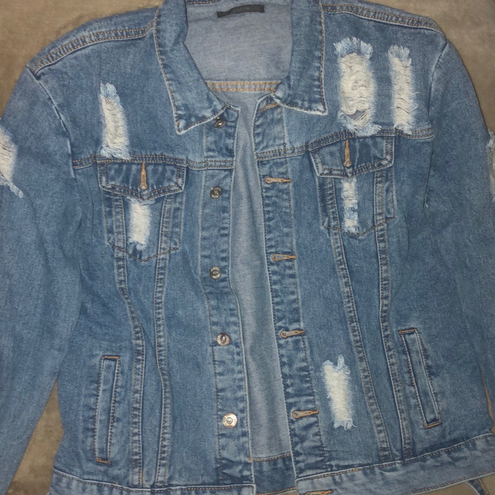 Ripped jean jacket
